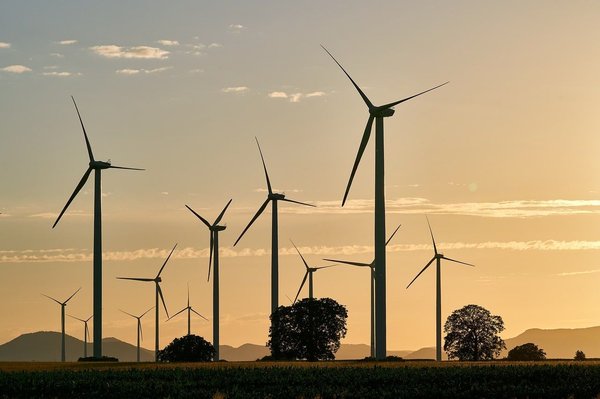 What are the economic benefits of renewable energy adoption in rural communities?